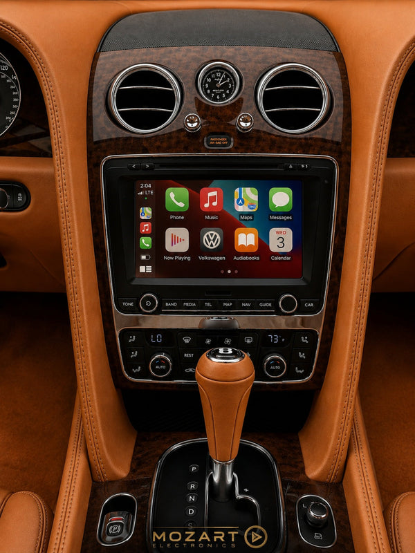 Bentley factory screen running Apple CarPlay after the plug-in interface upgrade, climate controls kept