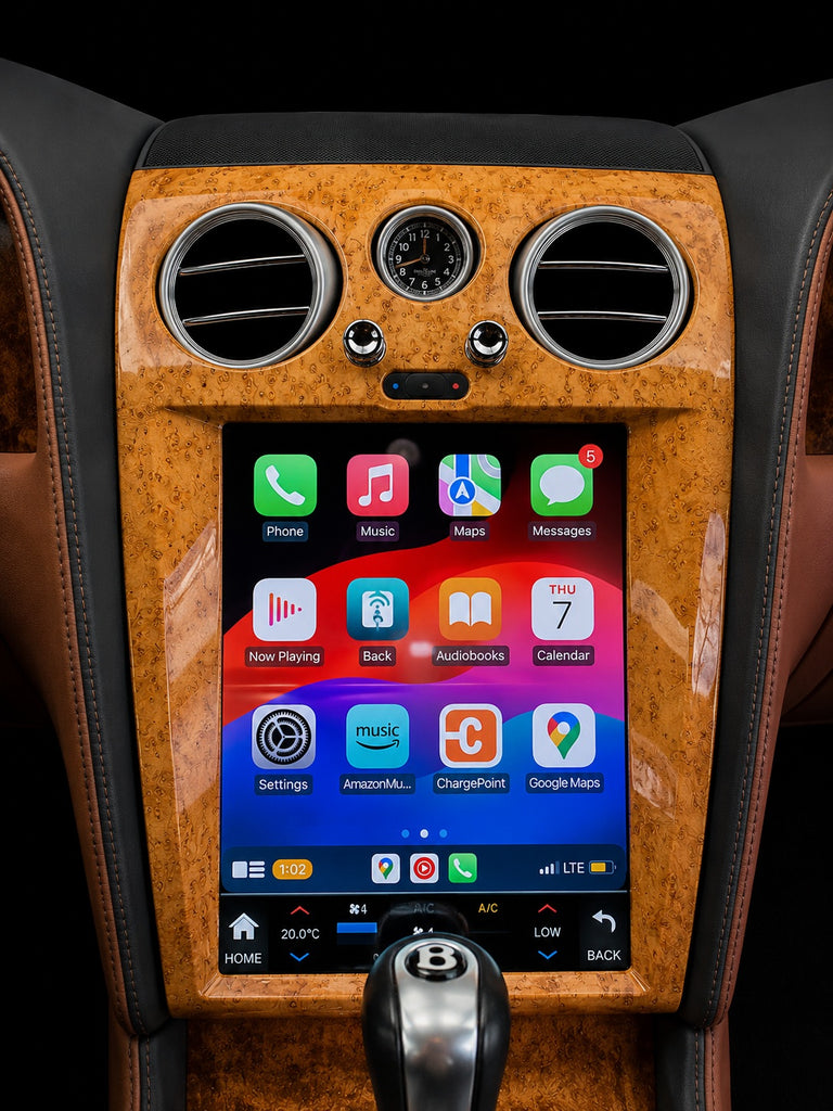 Bentley screen upgrade in light woodgrain trim running the Apple CarPlay home screen after installation