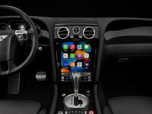 Load image into Gallery viewer, Bentley Continental GT dashboard after the screen upgrade with piano black trim seen from the driver seat