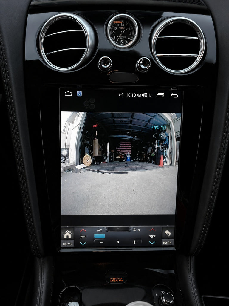 Reverse camera view on the upgraded Bentley touchscreen in piano black trim while parking